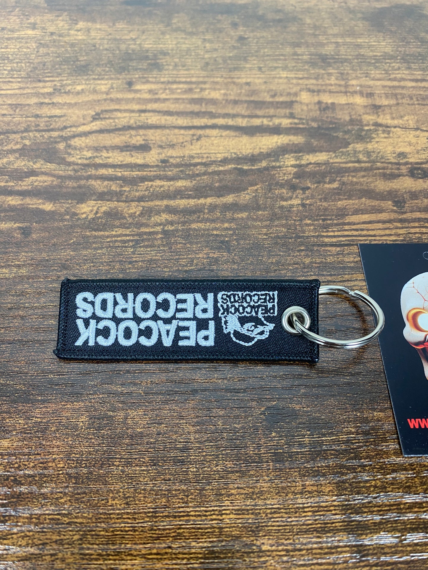Peacock Records keychain