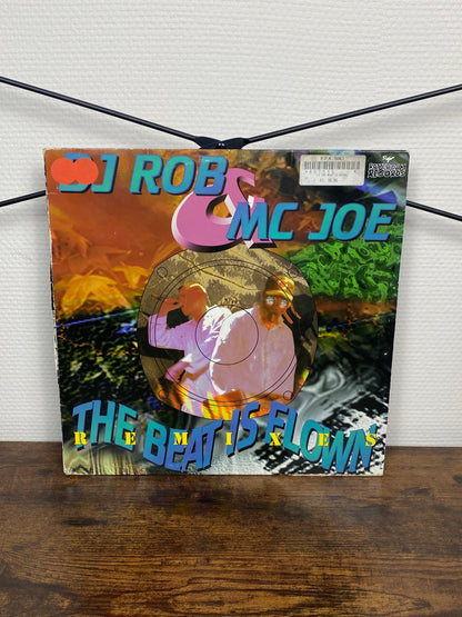 (1996) DJ Rob & MC Joe – The Beat Is Flown (Remixes) - (Vinyl)