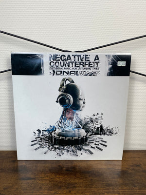 (2010) Negative A / Counterfeit – Disturbing Music For Disturbing Times (Vinyl)